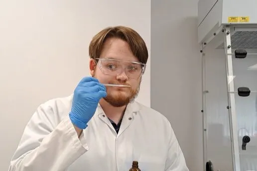 Kieren Spouge flavourist sniffing a flavour he has created